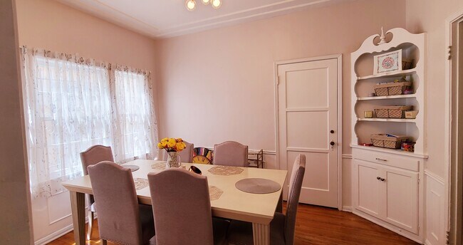 Dining room with built-ins. - 1003 S Holt Ave