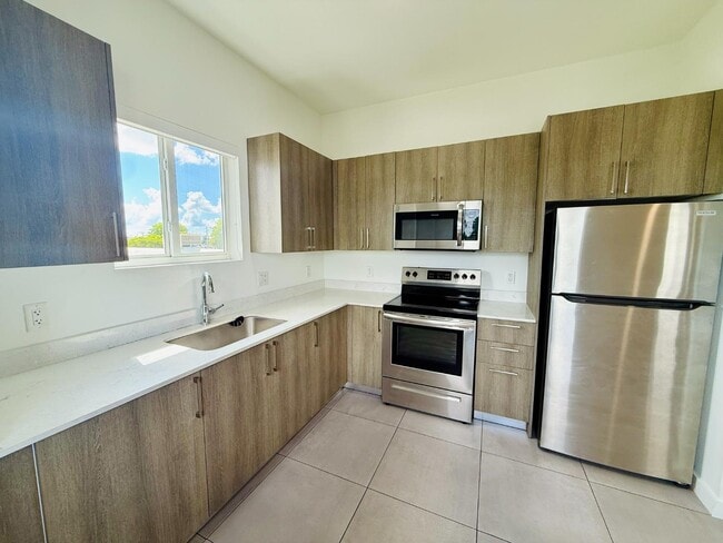 Photo - 1295 W 69th St Apartment