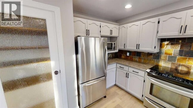 Photo du bâtiment - 9533-9563 63 Ave