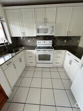 Building Photo - 6011 W 24th Ave
