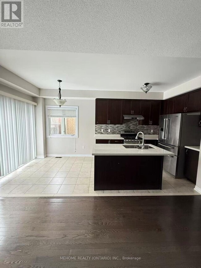 Photo du bâtiment - 22 Memon Pl