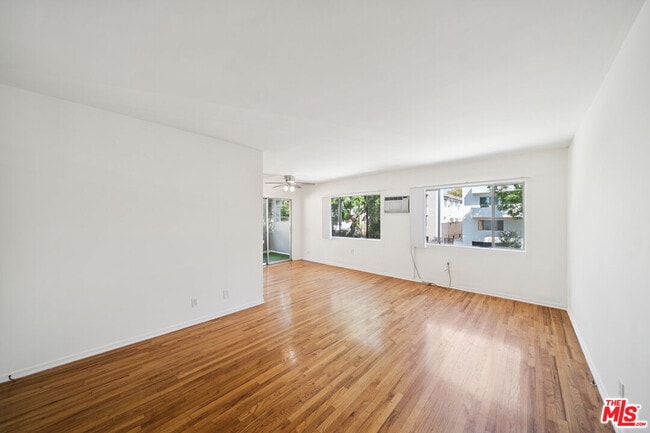 Building Photo - 1027 N Edinburgh Ave