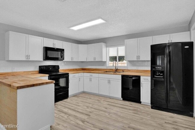 Building Photo - 3 br, 3 bath House - 3170 Melaleuca Dr