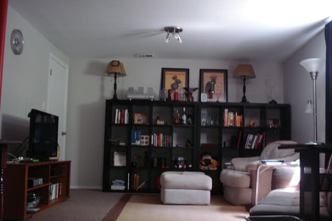 Inside with permanent bookshelves - 10112 Stoneybrook Dr