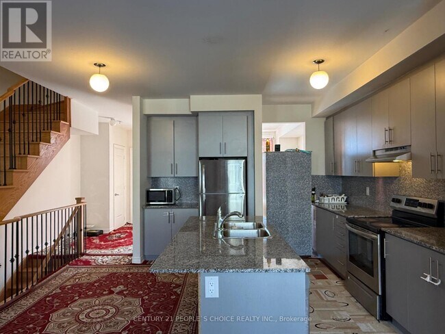 Photo du bâtiment - 22 Queenpost Dr