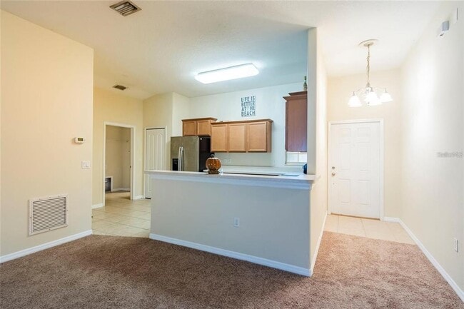 Foto del edificio - 8117 Alamosa Wood Ave