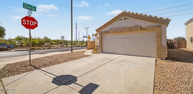 Building Photo - 23765 W Desert Bloom St
