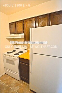 Building Photo - Stunning 2 Bedroom Holladay Condo! No Depo...