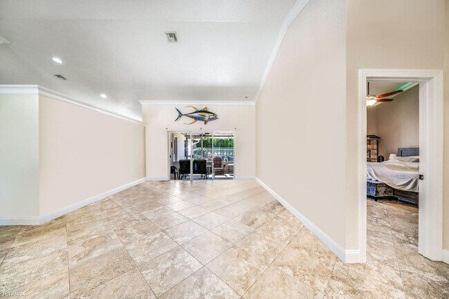 Building Photo - 4 br, 2 bath House - 6766 Blue Bay Cir