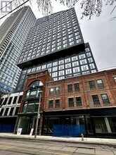 Building Photo - 100 Queen St E