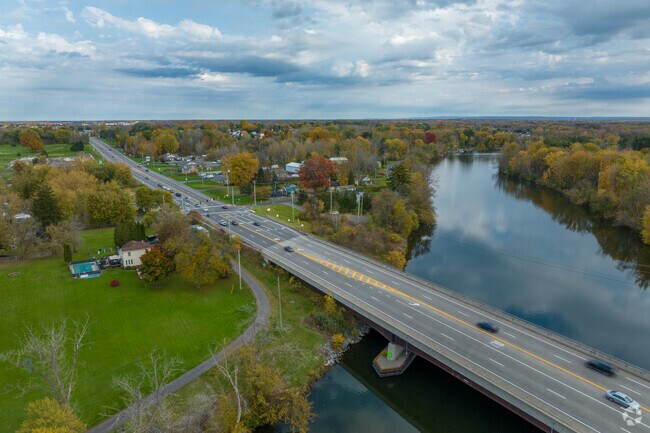 Belgium is inside the larger town of Clay and occupies the eastern shore of the river.