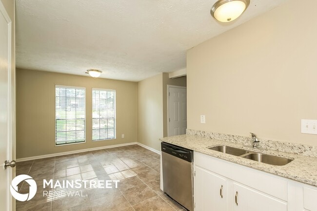 Building Photo - 8495 N Pond Dr