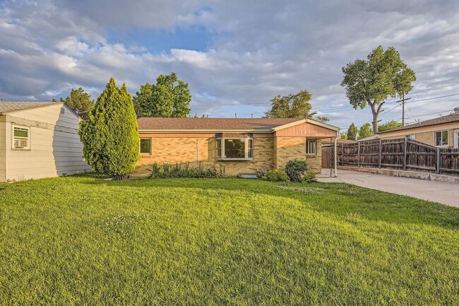 Building Photo - Spacious Home w/Large Backyard Only Blocks...