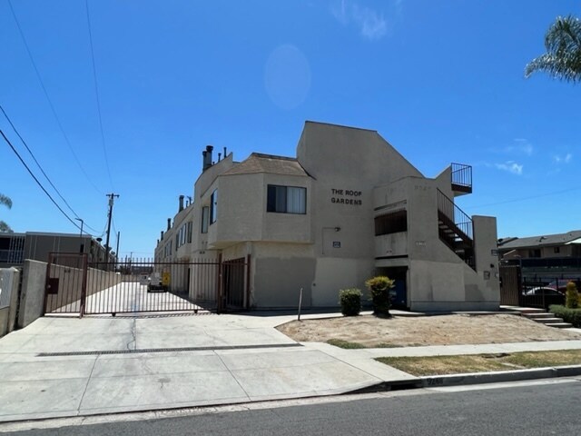 Front of Nine Unit Townhouse Style Apartment - 9248 Palm St