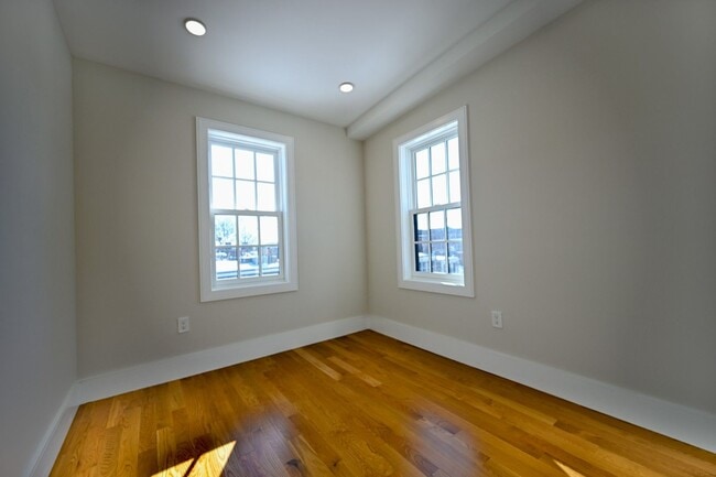 Building Photo - Brand New Penthouse in Bay Village, Central Heat/AC, In-Unit Washer and Dryer, Private Roof Deck