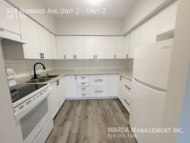 Photo du bâtiment - MODERN 1 BED/1 BATH MAIN FLOOR UNIT + HYDRO