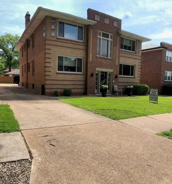 Building front and side view - 5926 Nagel Ave