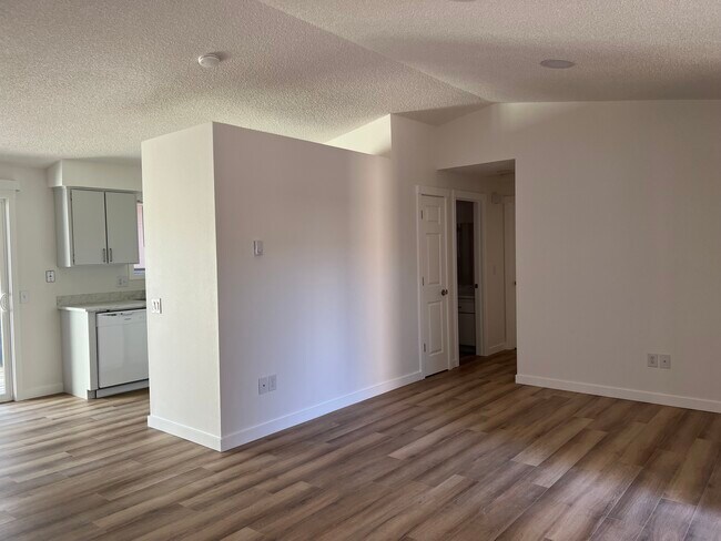 kitchen to left, bedrooms & bathroom to right - 2005 NE Holliday Ave