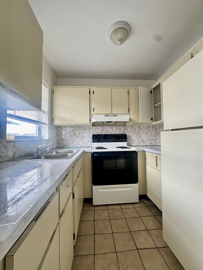 Photo - 5889 W 26th Ave Apartment