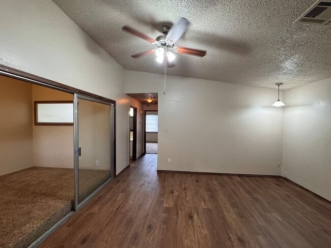 Building Photo - 2 bed duplex with 1 1/2 baths, bonus room and a 1 car garage for lease in SW OKC! (no fenced yard)