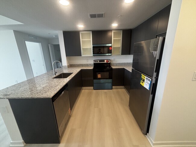 Foto del edificio - 5563 Millennia Park Dr