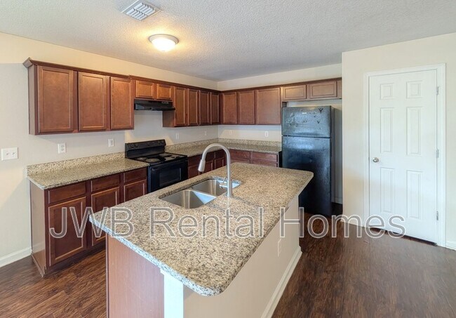 Foto del edificio - 5462 Village Pond Cir