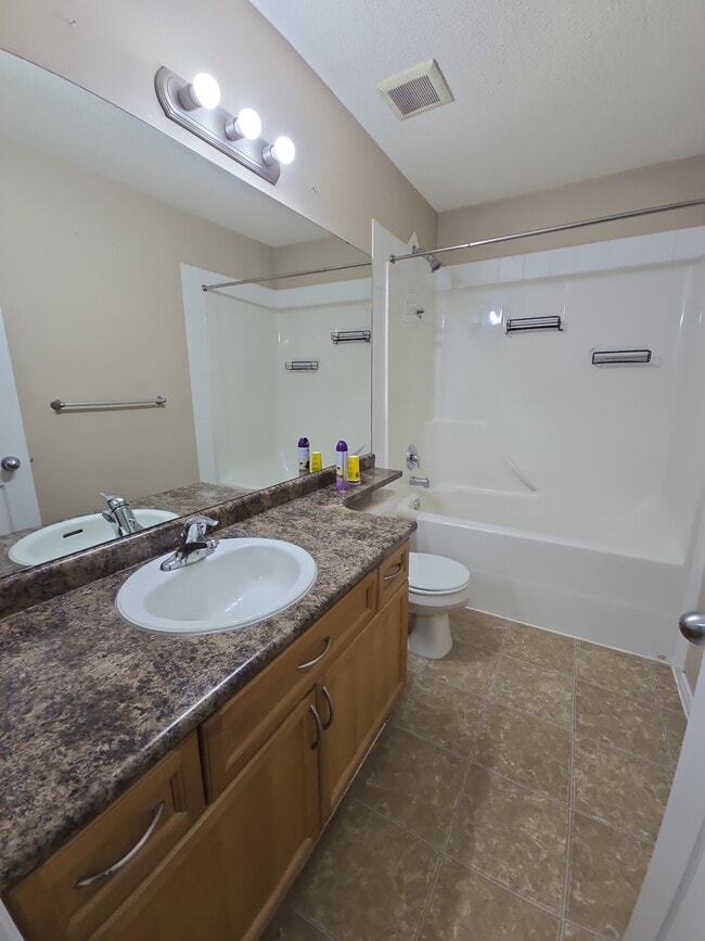 Building Photo - 3215-3226 26 Ave NW