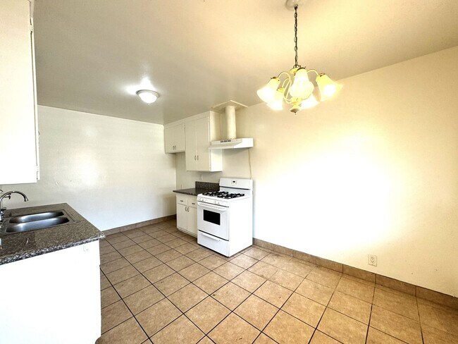 Building Photo - 1230 W 144th St