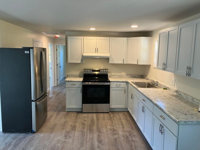 Foto del edificio - 6 Willowbrook Dr