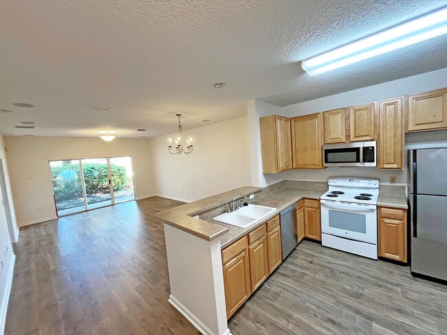 Building Photo - 214 Wooded Crossing Cir