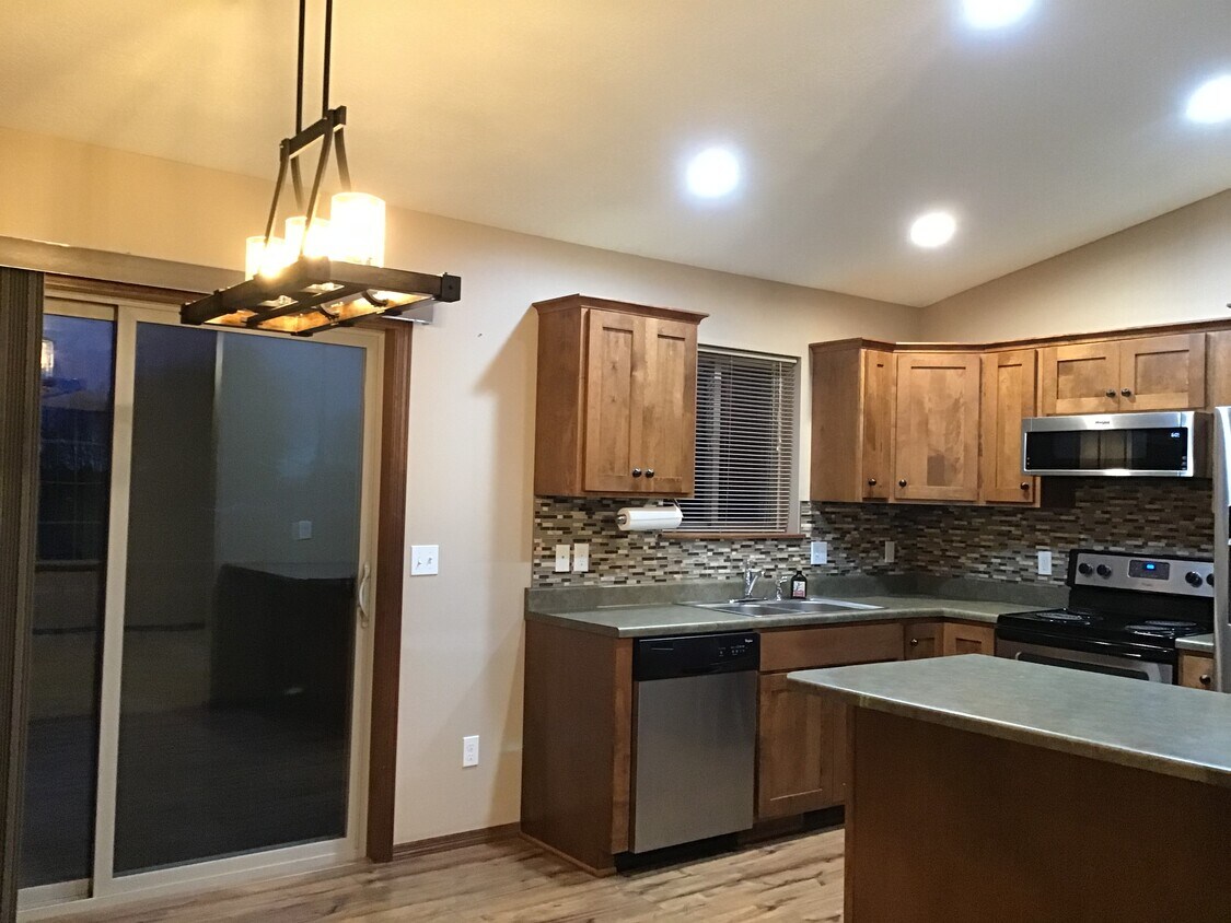 Plenty of room for your table, and a great view of your deck & fenced yard. - 4421 S Tribbey Trl