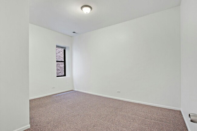 Building Photo - 4527 S St Lawrence Ave