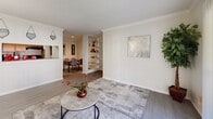 Located at 10225 Bissonnet St in Houston, TX, this 1-bedroom, 1-bathroom unit offers a practical and comfortable single-floor layout. The living room is bright and open, featuring crown molding, light wood-style flooring, and a large sliding glass door fitted with vertical blinds that invite natural light and provide access to the outdoors. The space flows seamlessly into a separate dining area, making the layout versatile for everyday living and entertaining.

The kitchen is positioned adjacent to the living area and features warm-toned wood cabinetry, granite-style countertops, a tiled backsplash, and a pass-through window that connects it to the living space, enhancing the open feel.

The bedroom is a well-sized retreat equipped with a ceiling fan, a window with outdoor views, and light wood-style flooring consistent with the rest of the unit. It connects directly to a generously sized walk-in closet complete with dual hanging rods on two walls and a built-in shelving unit, offering ample storage.

The bathroom features a full bathtub and shower combo with floor-to-ceiling stone-look tile, a wood-toned vanity with granite countertops, and a clean, functional design. Overall, the unit presents a cohesive, neutral palette throughout.