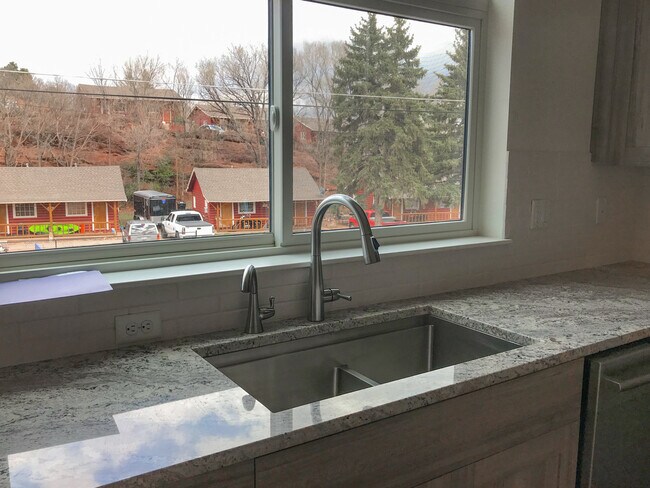 Sink is to the right of the pantry. Dishwasher is a very quiet Bosch, 42 db, stainless steel. - 109 Beckers Ln