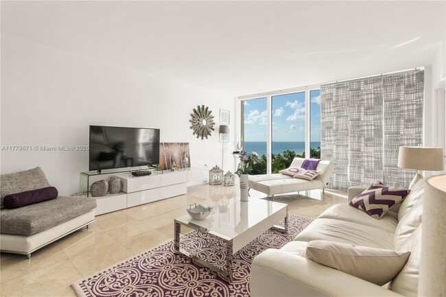 Building Photo - 10275 Collins Ave