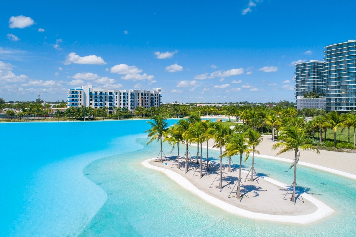 Discover resort-style living centered around SoLé Mia's stunning a 7-acre, Crystal Lagoon®. - SoLe Mia Rentals