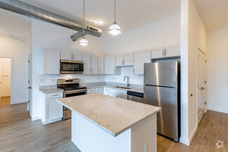 2BR, 2BA - 1180SF - Open Kitchen with Quartz Countertops - Allegheny City Stables Lofts