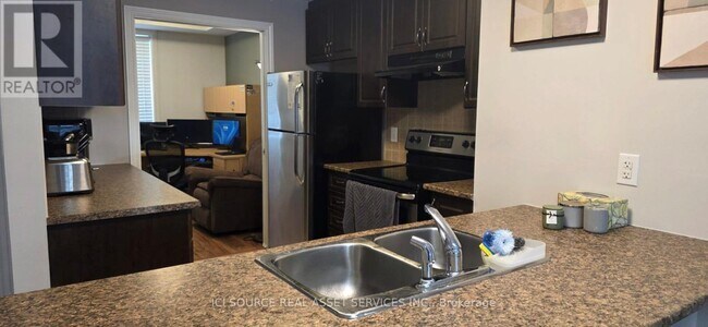 Photo du bâtiment - 3789 B CANYON WALK DRIVE