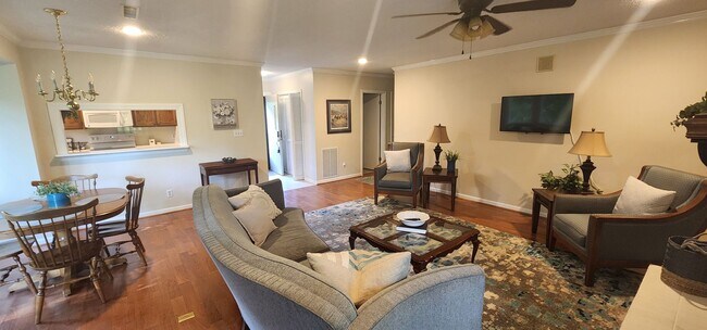 Building Photo - Fully furnished meticulously maintained upper condo
