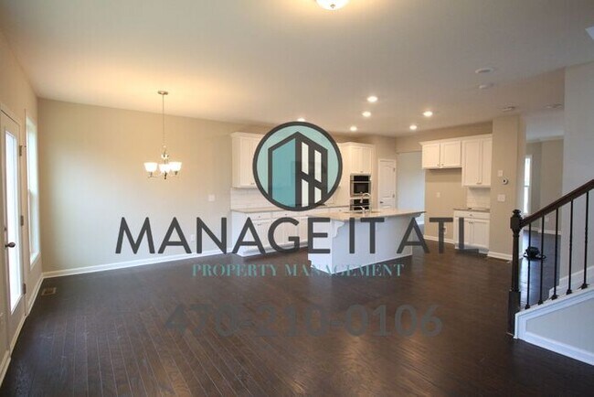 Foto del edificio - A gorgeous townhouse in the Suwanee Walk n...