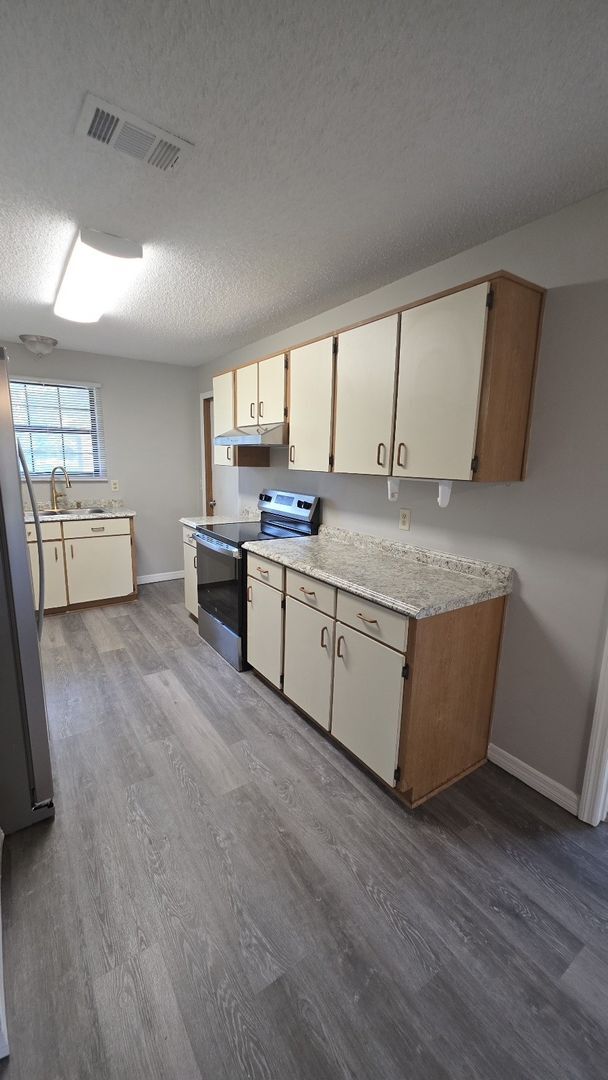 Foto del edificio - Palm Coast 4 Bedroom 2 Bath in the W Section