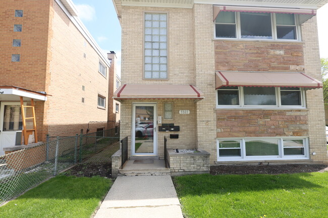 Foto del edificio - 5501 N Mango Ave