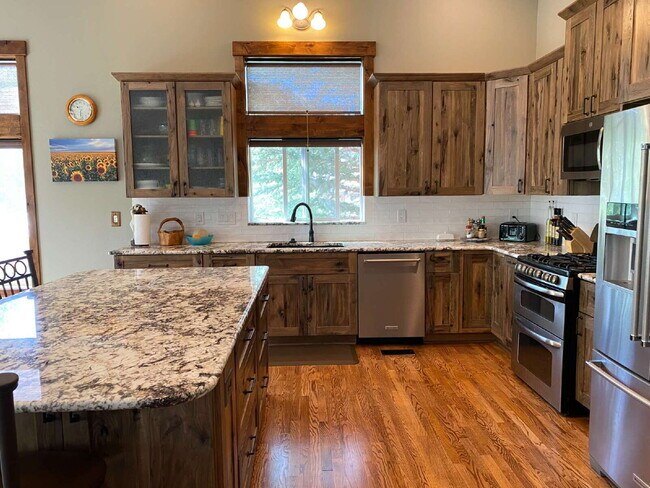 Building Photo - "Spacious 4-Bedroom Retreat with 3 Full Ba...
