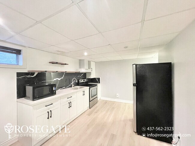 Building Photo - Charming 3-Bedroom Basement Apartment in B...