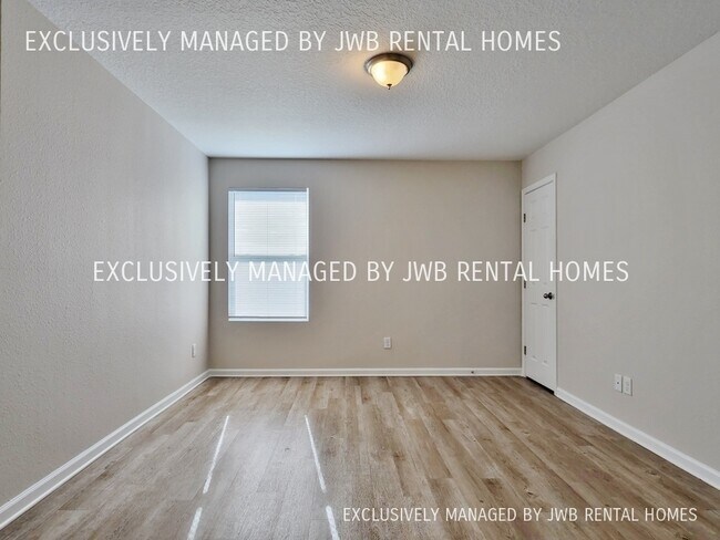 Foto del edificio - 6781 Lake Mist Ln