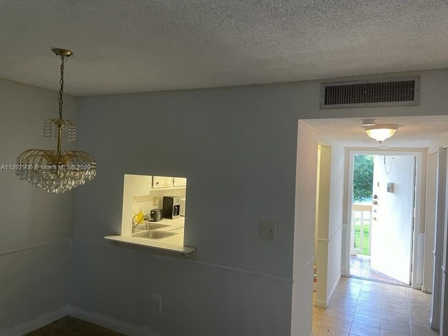 Building Photo - 6000 NW 64th Ave