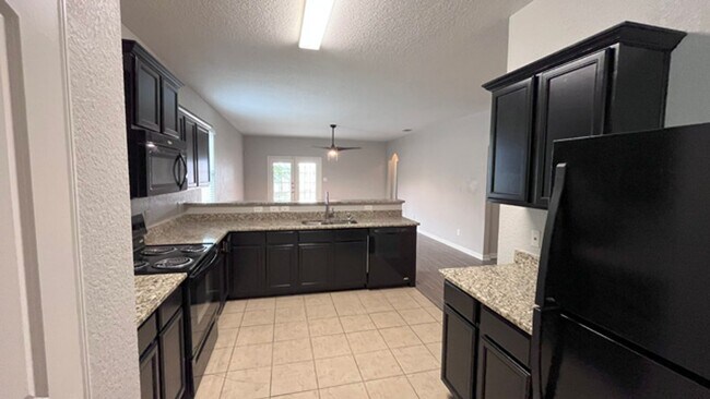 Building Photo - Modern Living with Classic Touches