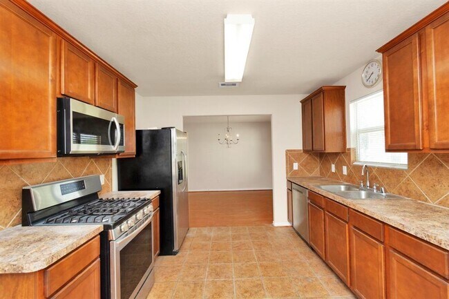 Building Photo - 8906 Wildbird Ln