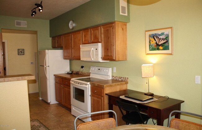 Building Photo - 7050 E Sunrise Dr