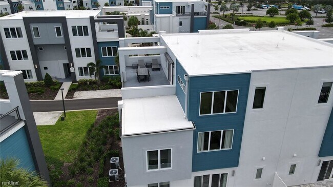 Foto del edificio - 4 br, 3.5 bath Condo - 7740 Sandy Ridge Dr...